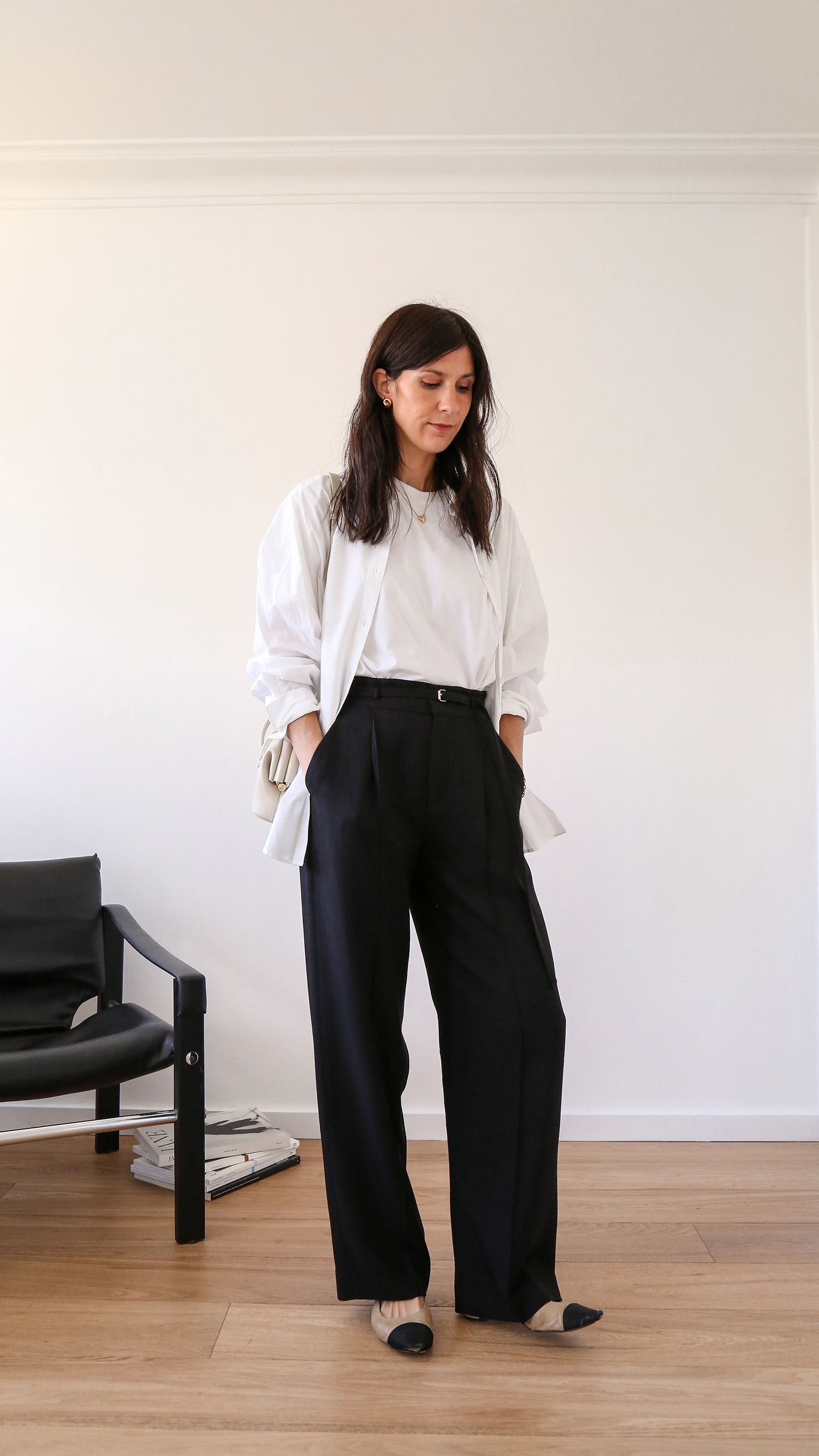 Wearing white tee and black pants with white shirt the row inspired Kendall Jenner